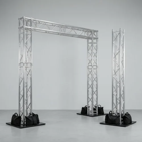 estrutura-truss-1 Portal de truss de alumínio e torre avulsa, com bases lastradas por sacos de areia