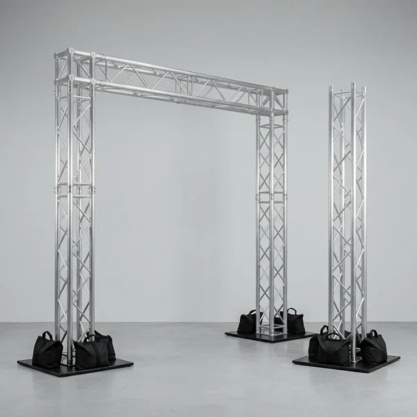 estrutura-truss-1 Portal de truss de alumínio e torre avulsa, com bases lastradas por sacos de areia